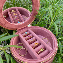 Load image into Gallery viewer, This beautiful soft and stylish box provides a protective space to store your jewelry. Comes with a mirror and multiple compartments. We love this jewelry box so much, that we even wear it as an accessory.