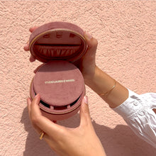 Load image into Gallery viewer, This beautiful soft and stylish box provides a protective space to store your jewelry. Comes with a mirror and multiple compartments. We love this jewelry box so much, that we even wear it as an accessory.