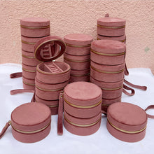 Load image into Gallery viewer, This beautiful soft and stylish box provides a protective space to store your jewelry. Comes with a mirror and multiple compartments. We love this jewelry box so much, that we even wear it as an accessory.