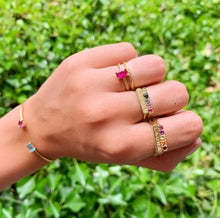 Load image into Gallery viewer, Horizontal signet ring. Ring with five colorful gemstones. Ruby, pink tourmaline, sky blue topaz, green tourmaline, citrine. One twisted 18k gold ring. lots of rings to mix and match. A you and me bracelet or toi et moi bracelet. Twisted 18k gold ring. Ruby ring with twisted band.