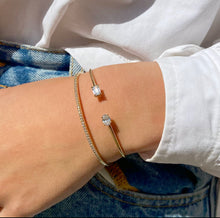 Load image into Gallery viewer, A beautiful classic bracelet in 18k gold with two diamonds shaped in an oval and emerald cut. Combined with our 18k gold eternity bracelet in Lab Grown Diamonds.