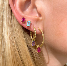 Load image into Gallery viewer, It's all in the details! Our studs are available in different colors. Choose your favorite colorful gemstone for that extra sparkle. Fine jewelry is fun and so are our studs. You can mix and match them with every other piece of our earring collection. Perfect as a first pair of earrings or small gift. Wear our studs individually or pared, it's up to you! This picture shows you how to layer and combine our earrings. Mix and match different styles, shapes and colors.