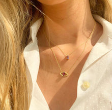 Load image into Gallery viewer, Elegant, classy, subtle, timeless but oh-so fun with this oval pendant. Layer them with all of our differents designs. Perfect for everyday, every occasion and character. We just can't get enough of these handmade necklaces with colorful handpicked gemstones. Layered with our eye-necklace in the picture. The gemstone of this rectangle / emerald cut necklace is Amethyst.