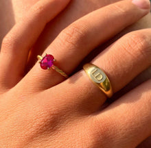 Load image into Gallery viewer, This is our twist on the historical signet ring. Custom made with your (or your loved ones) Initials! Combined with a Ruby ring in this picture.