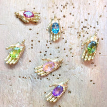 Load image into Gallery viewer, High-Five! May we introduce to you: our 18k Gold Hand Necklace with an oval gemstone. It's a unique and contemporary design that will match your everyday fashion items. Personalize this beautiful necklace with one of our handpicked colorful gemstones and catch all the attention!