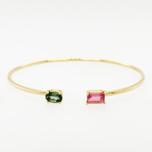 Load image into Gallery viewer, Just like you and me, toi et moi, jij en ik, this piece of fine jewelry with unique shaped gemstones is precious and special. This example is with a rectangle shaped / Emerald cut pink tourmaline and an oval green tourmaline.
