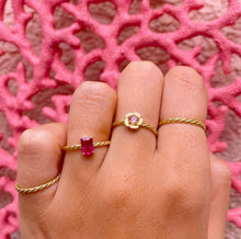 Load image into Gallery viewer, Our Emilia Ring is designed as a flower and named after my great grandmother &amp; mother. The hibiscus flower represents feminine energy. It is usually given to the women you love the most. Giving a woman an Hibiscus means you think she is beautiful (inside &amp; out). Combined with our Twisted Rings. Gemstone of the Emilia Ring: Pink Tourmaline.
